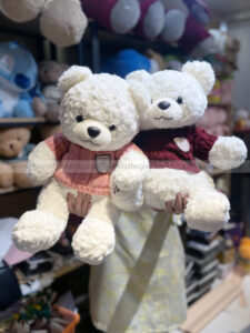 Gấu bông Teddy lông xoắn áo len